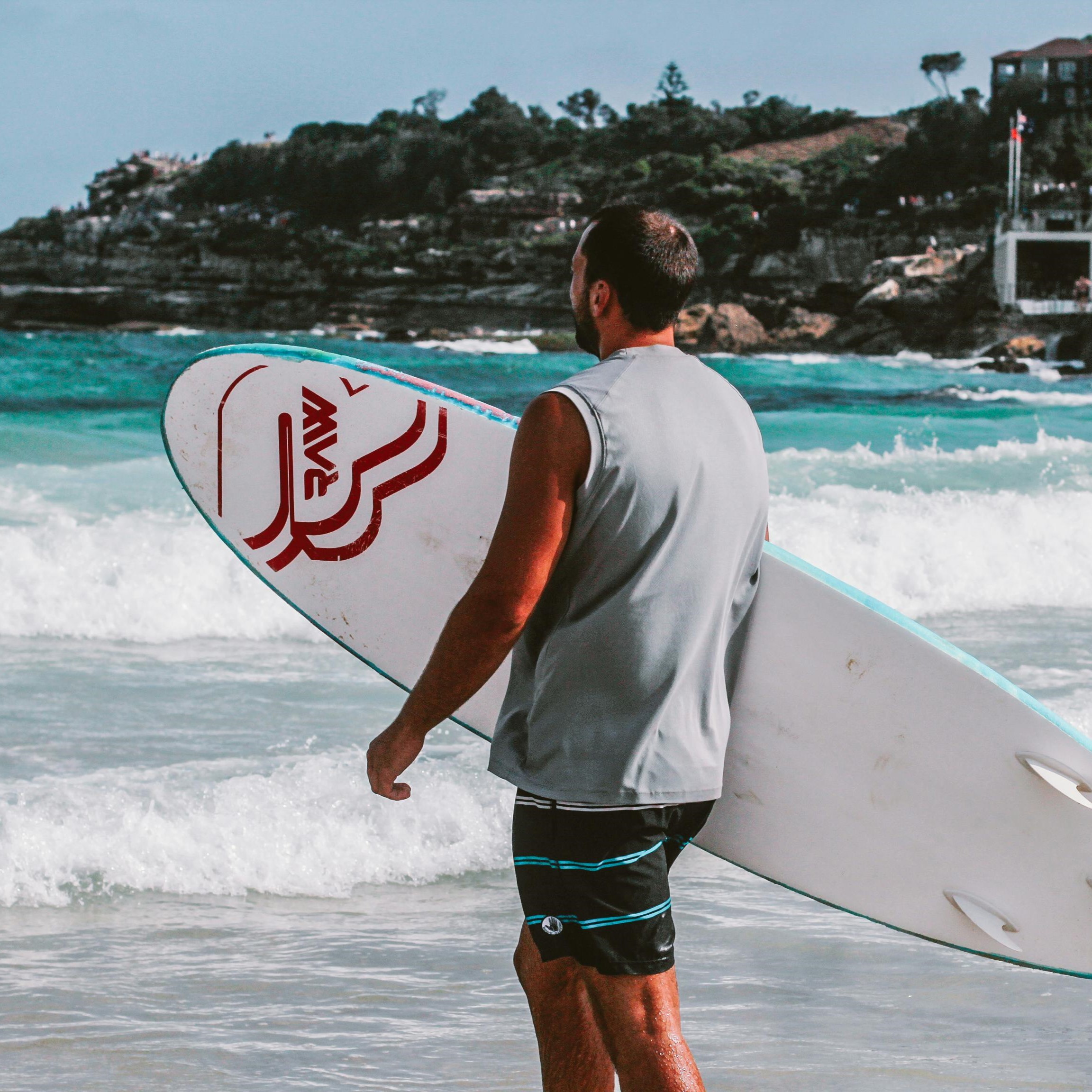 Surfer with his board